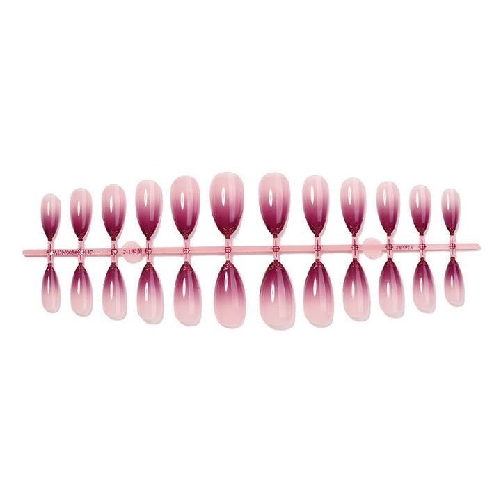 Artificial nail set with ombre design and glitter tips Stornfield