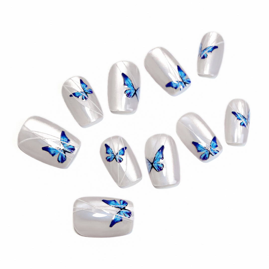 Creative nail extensions with intricate butterfly design Stornfield