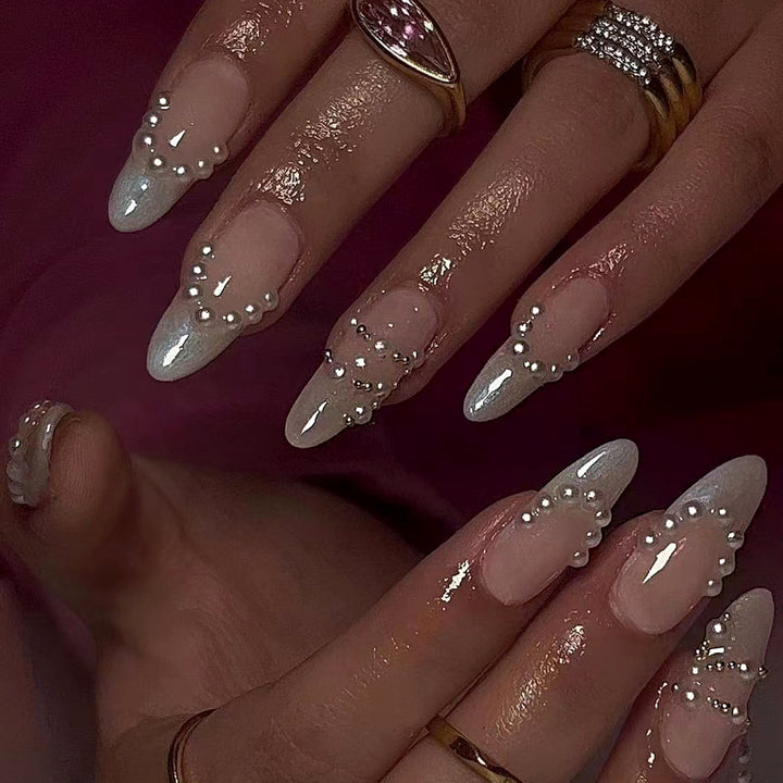 Elegant gel nails with pearl decoration Stornfield