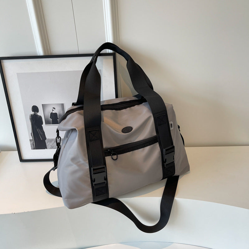 Spacious sports duffel bag with ergonomic carrying handles and water-repellent material Stornfield