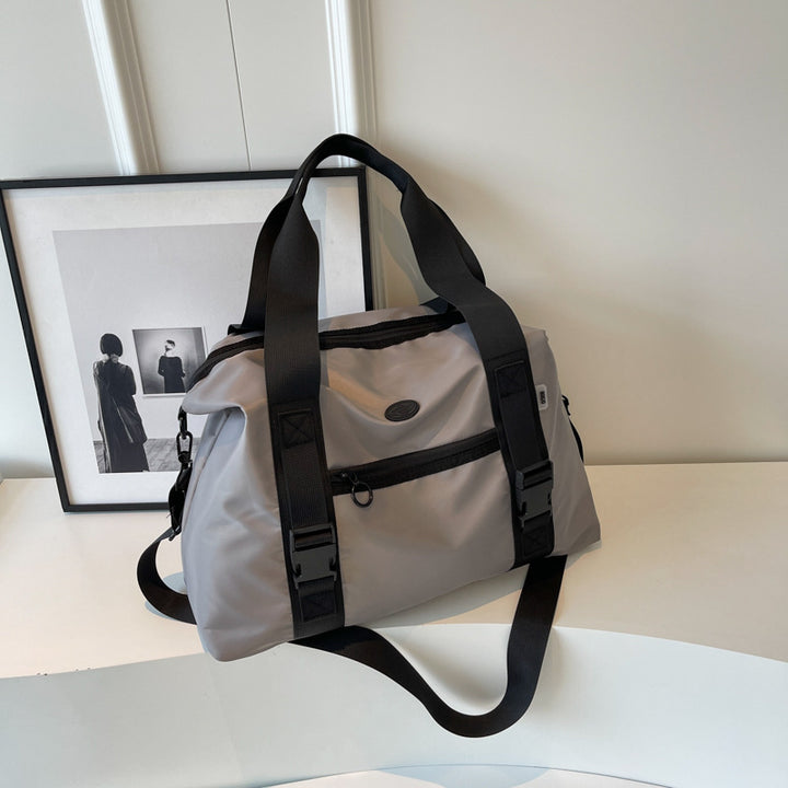 Spacious sports duffel bag with ergonomic carrying handles and water-repellent material Stornfield