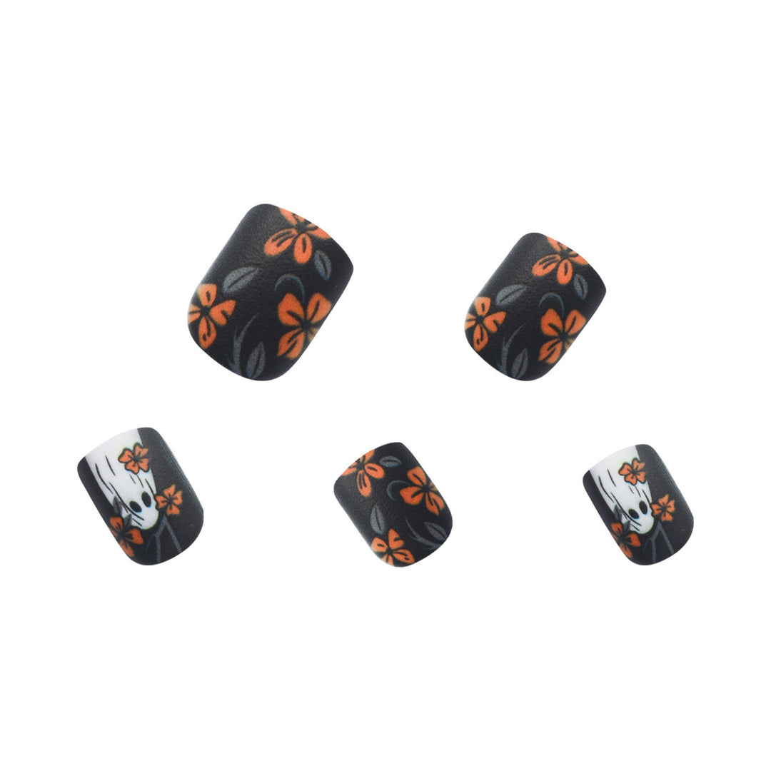 Acrylic nail set with spooky ghost design and floral accents Stornfield