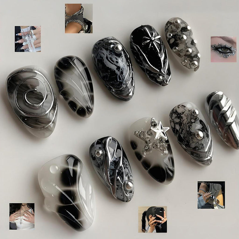 Art nail set with artistic patterns and glitter accents Stornfield