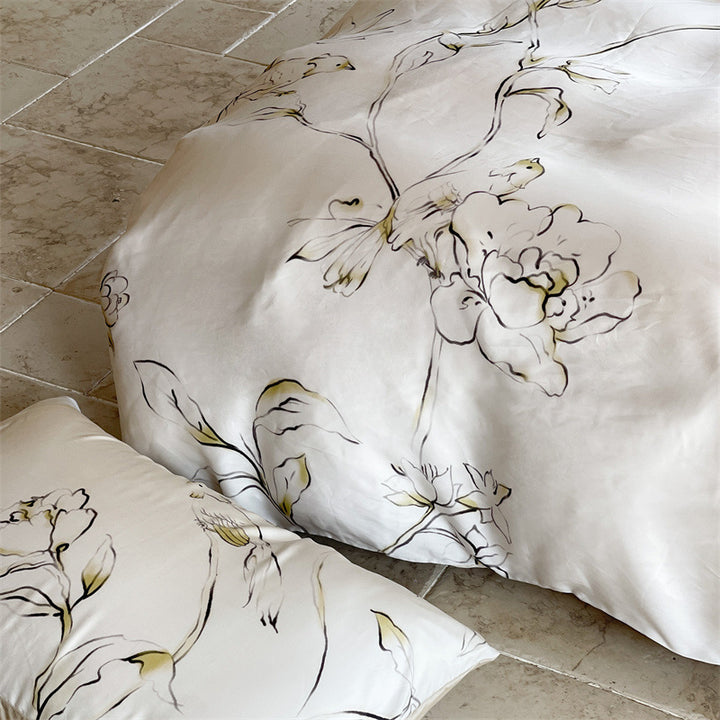 Satin bedding set with floral print and ruffle