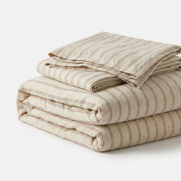 Linen bedding set with fine pinstripes and reversible function