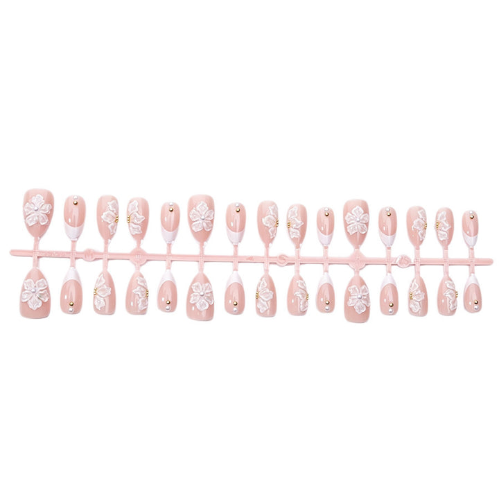 Nail art set with delicate floral patterns and elegant details Stornfield