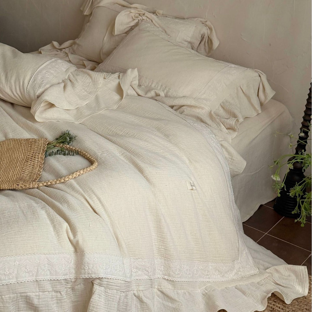 Bedding set in country style with ruffle details and fine embroidery
