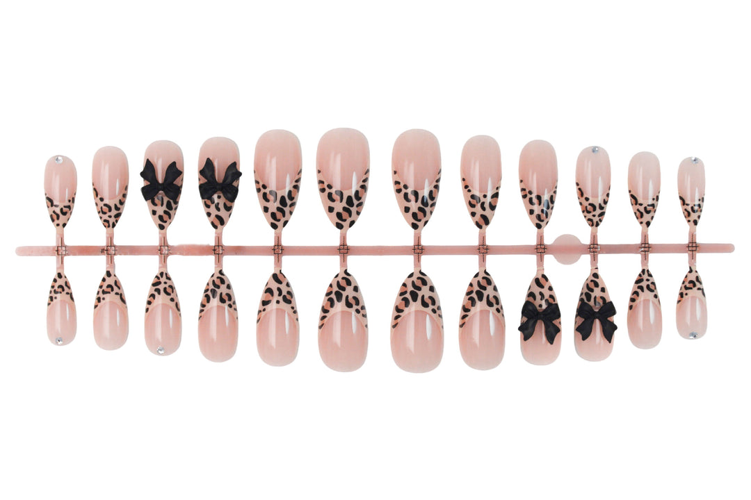 Animal-themed artificial nail set with elegant bows Stornfield