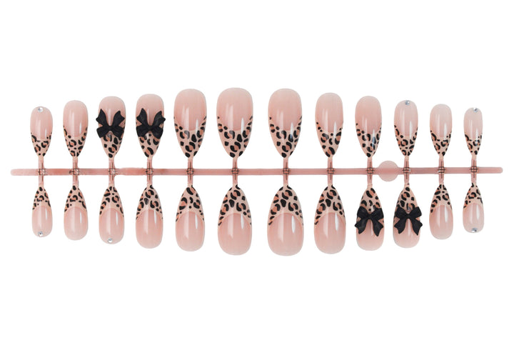 Animal-themed artificial nail set with elegant bows Stornfield