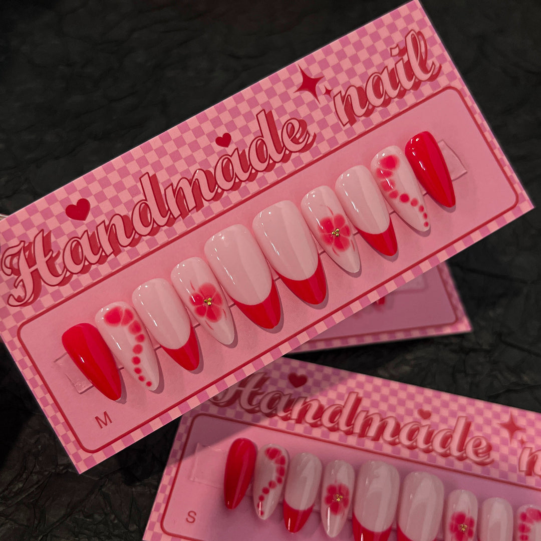 Artistic acrylic nails with floral design and trendy colors Stornfield