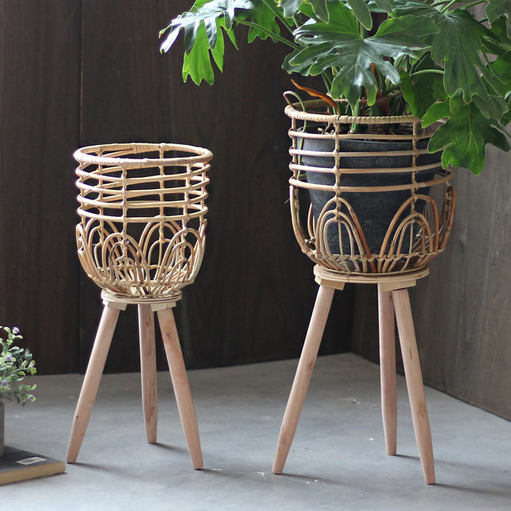 Stylish plant stand made of rattan and wood Stornfield