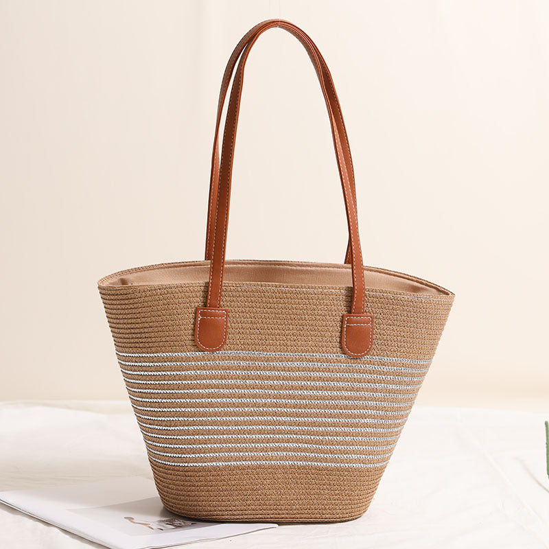 Elegant bast handbag with leather accents Stornfield
