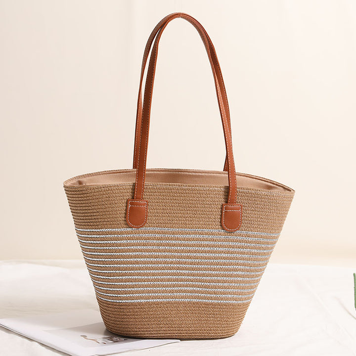 Elegant bast handbag with leather accents Stornfield