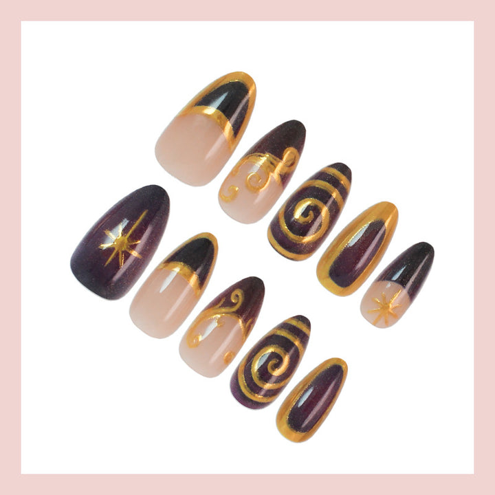 Acrylic nail set with elegant spiral patterns and glamorous golden accents Stornfield