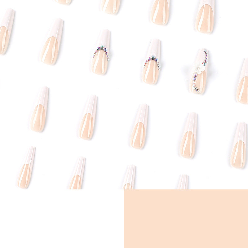 Creative artificial nails with elegant rhinestone and floral accents Stornfield