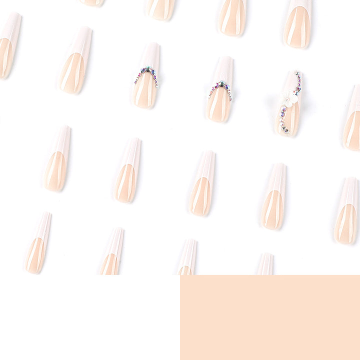 Creative artificial nails with elegant rhinestone and floral accents Stornfield