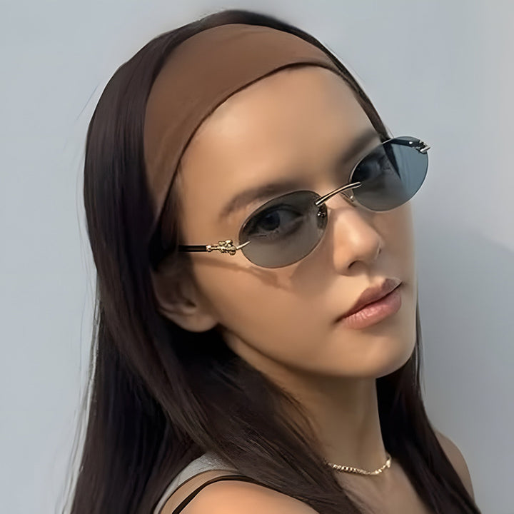 Women oval sunglasses with luxurious metal frame and mirrored lenses Stornfield