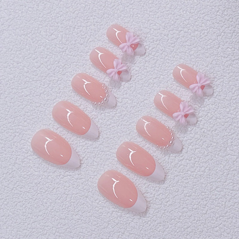 Elegant Artificial Nails with Bows and Pearl Design Stornfield