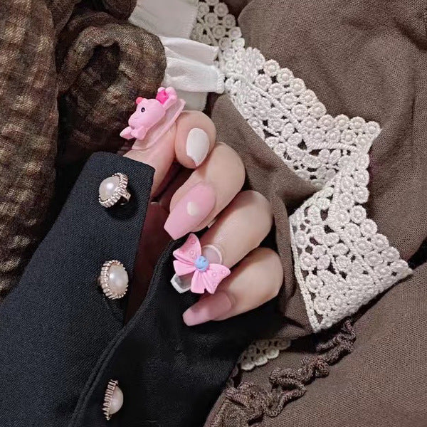 Artificial nail art with playful animal design Stornfield