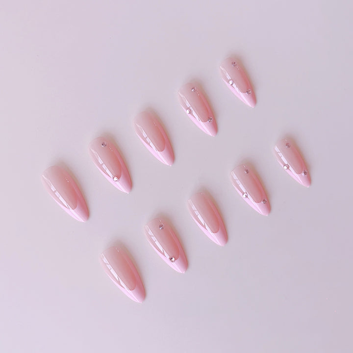 Artificial nail set with elegant glitter accents Stornfield