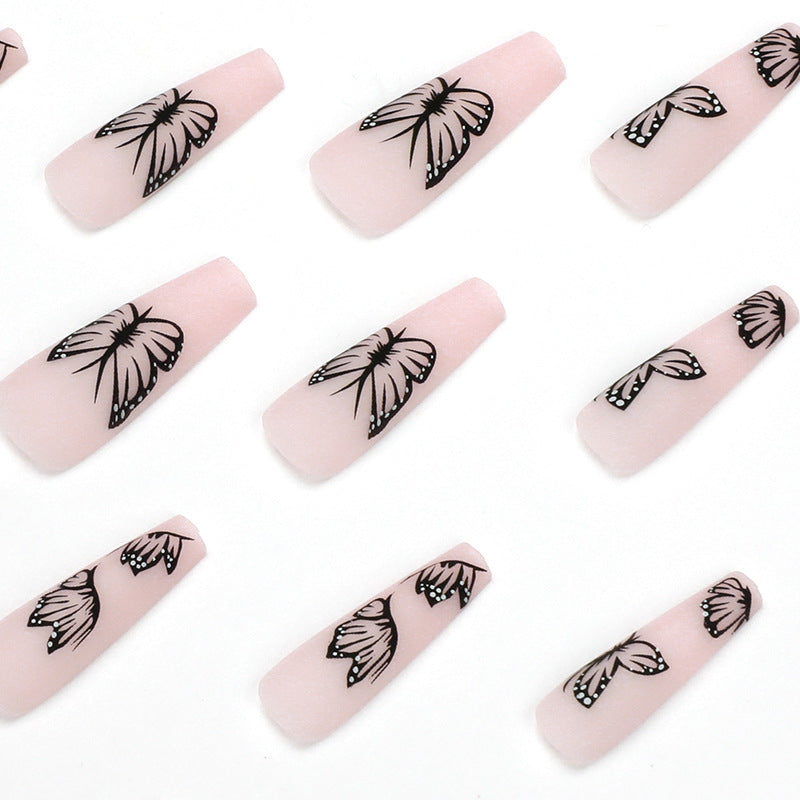Artistic Nail Extensions with Butterfly Design Stornfield