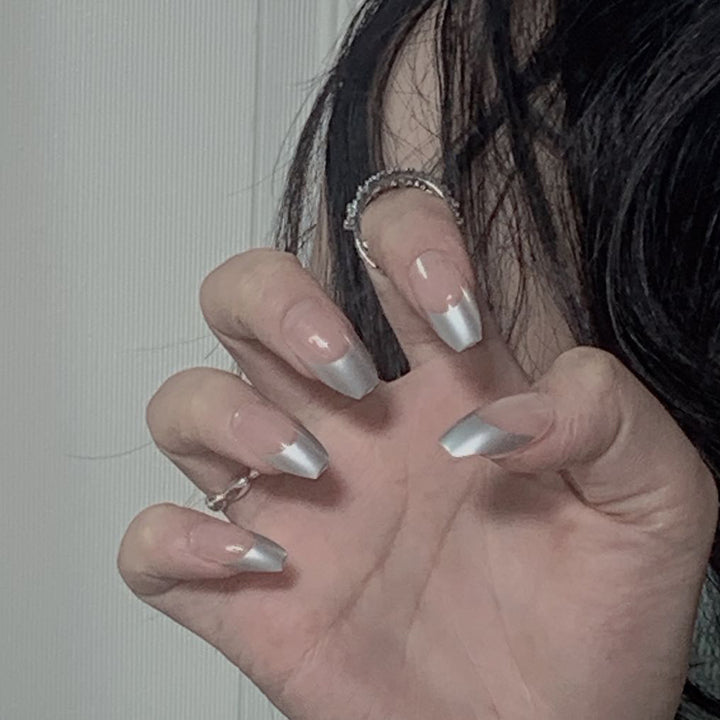 Artificial stiletto nails with glitter accents and elegant French tip Stornfield