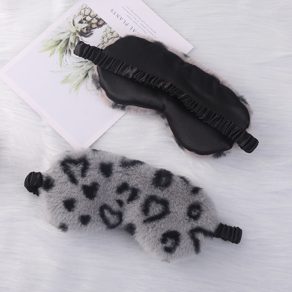 Women's cuddly faux fur sleep mask with heart-embossed surface and gathered comfort band Stornfield