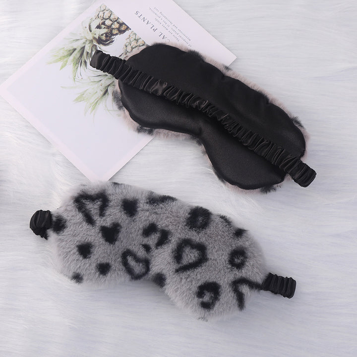 Women's cuddly faux fur sleep mask with heart-embossed surface and gathered comfort band Stornfield