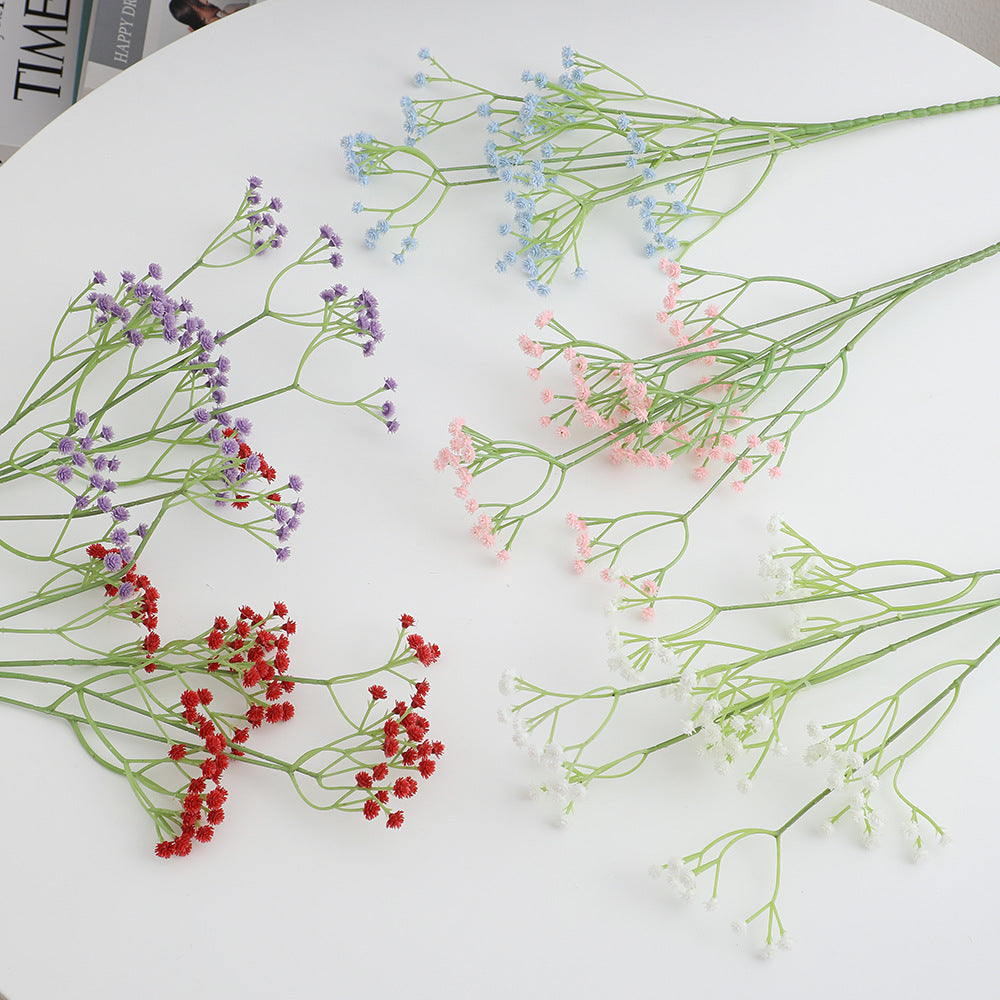 Decorative artificial flower branch with fine purple flowers