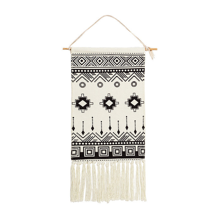 Woven cotton blend wall hanging with graphic ethnic pattern and long fringes Stornfield