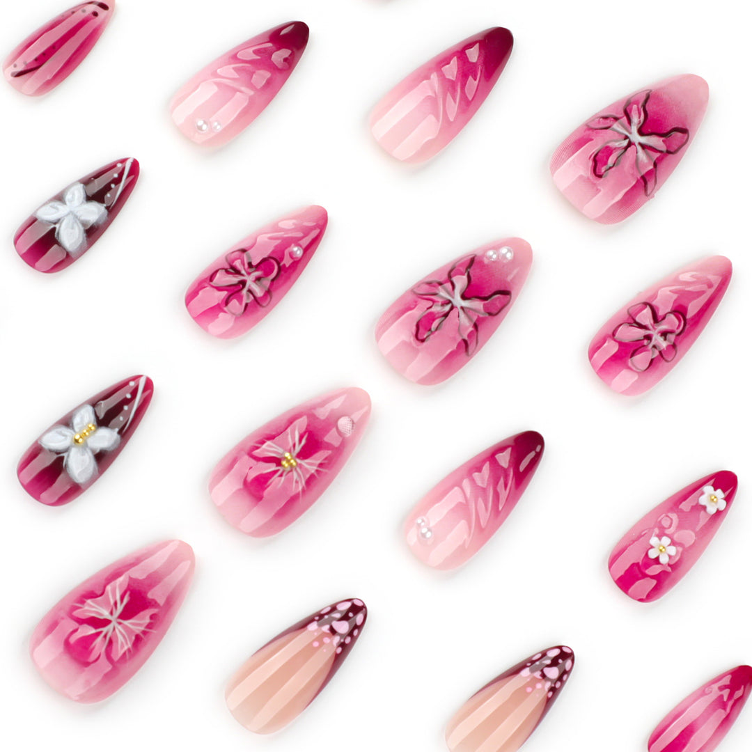 Artful nail extensions with floral details and ombre effect Stornfield