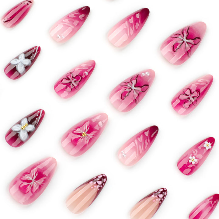 Artful nail extensions with floral details and ombre effect Stornfield