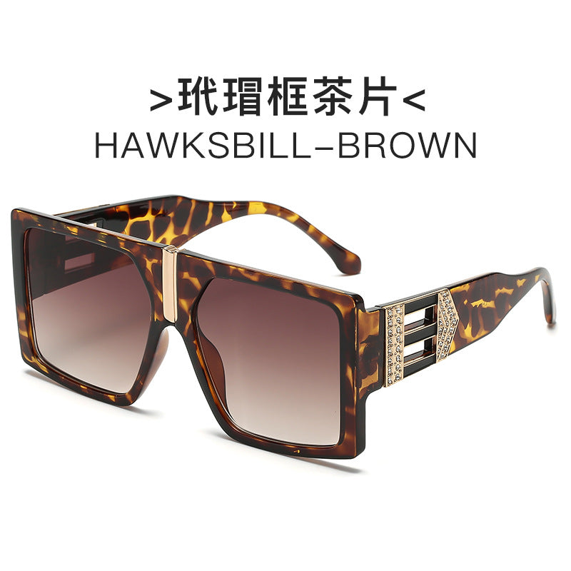 Ladies elegant rectangular sunglasses with glamorous embellishments Stornfield