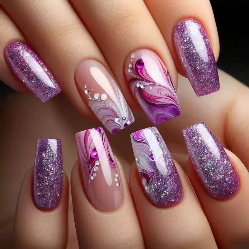 Acrylic nail set with luxurious color gradients and sparkling accents Stornfield