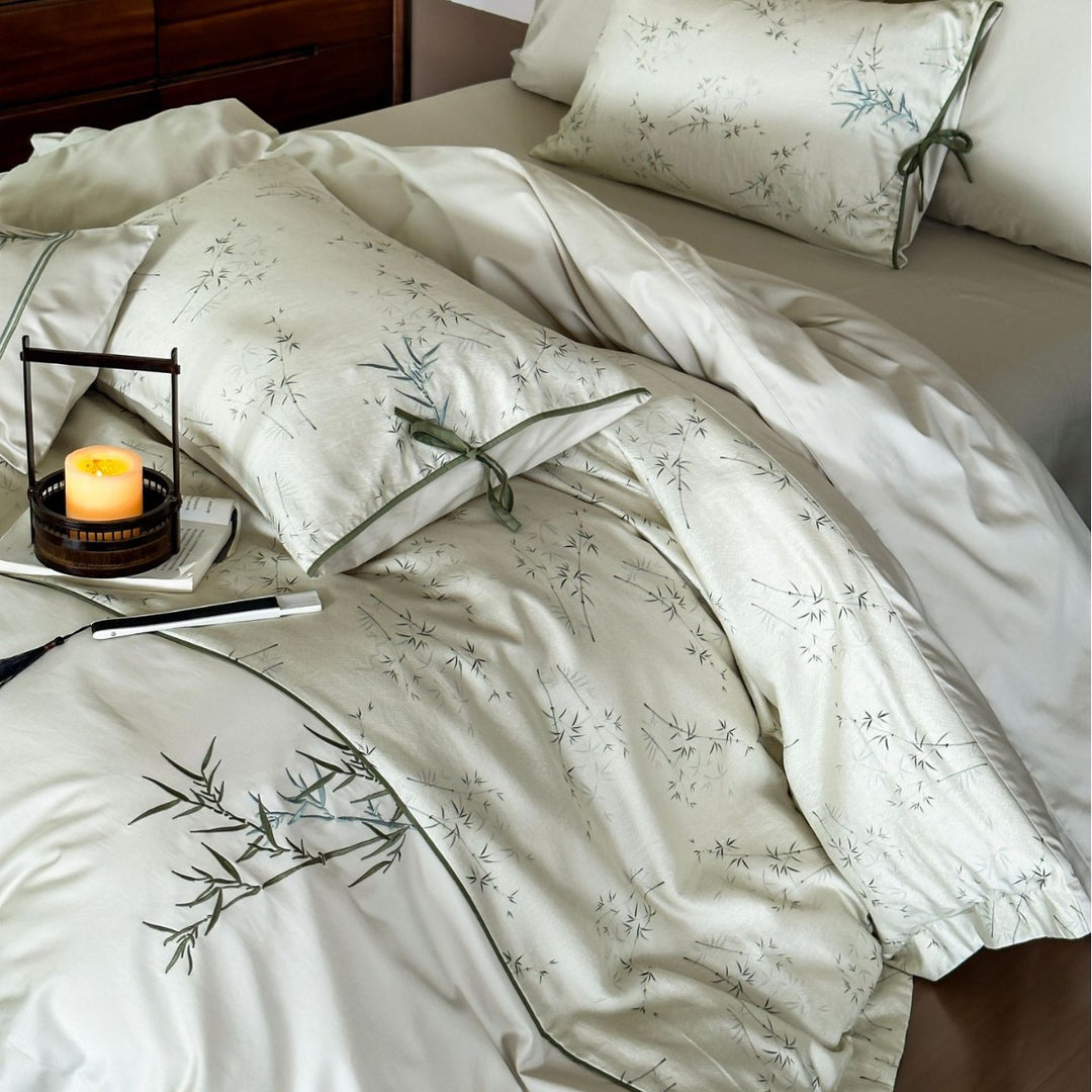 High-quality cotton satin bedding with subtle bamboo motif and piping