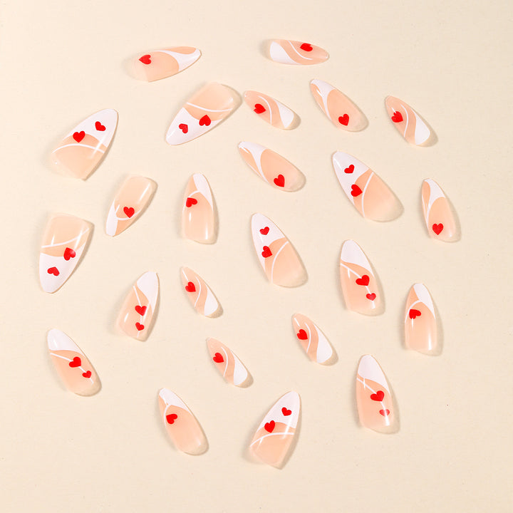 Heart-Embellished Stiletto Nail Art Stornfield