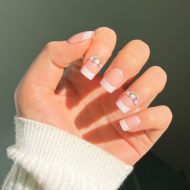 Artful Nail Extensions with Elegant Jewelry Accents Stornfield