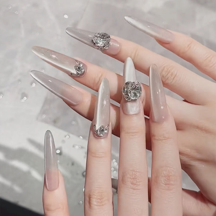 Acrylic nail set with glitter design and elegant 3D applications Stornfield