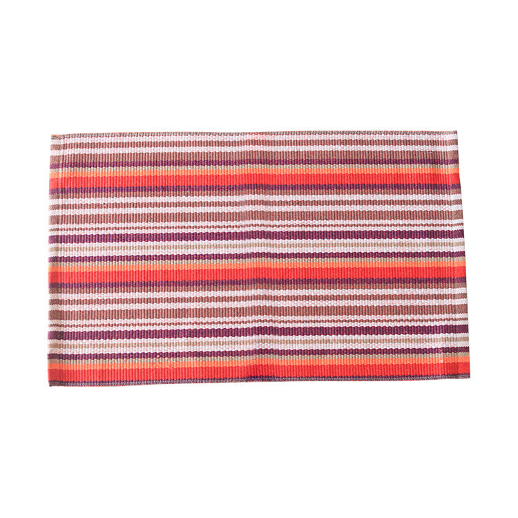 Woven colorful table runner with fringes and checkered structure