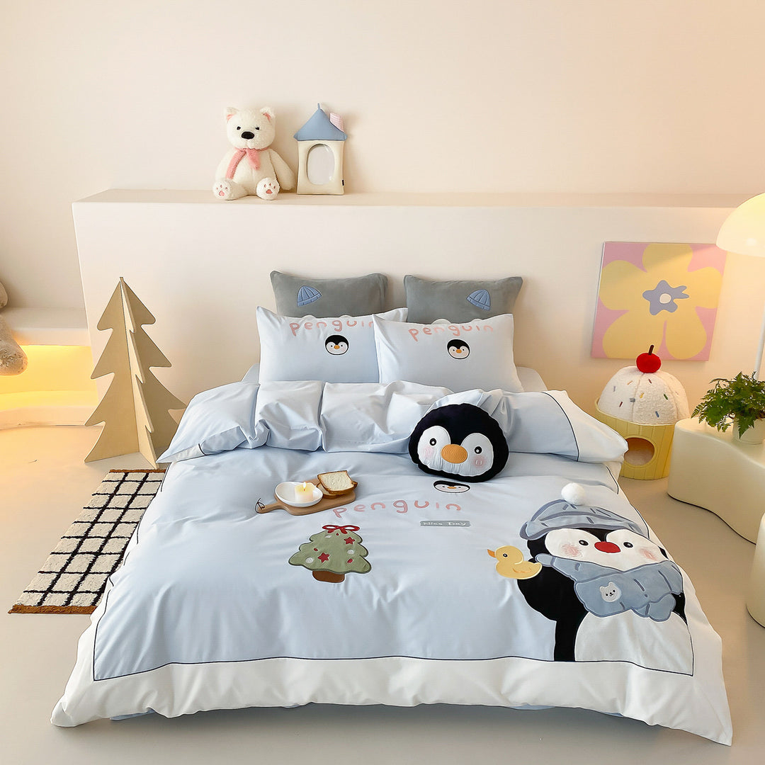 Children's bedding set with penguin appliqué and soft cotton blend