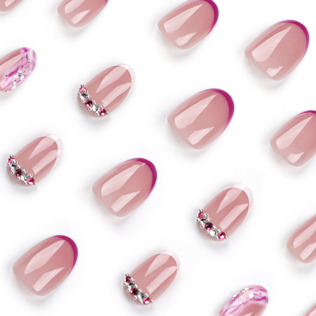Elegant artificial nails with glamorous gradient colors and rhinestone accents Stornfield