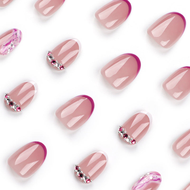Elegant artificial nails with glamorous gradient colors and rhinestone accents Stornfield
