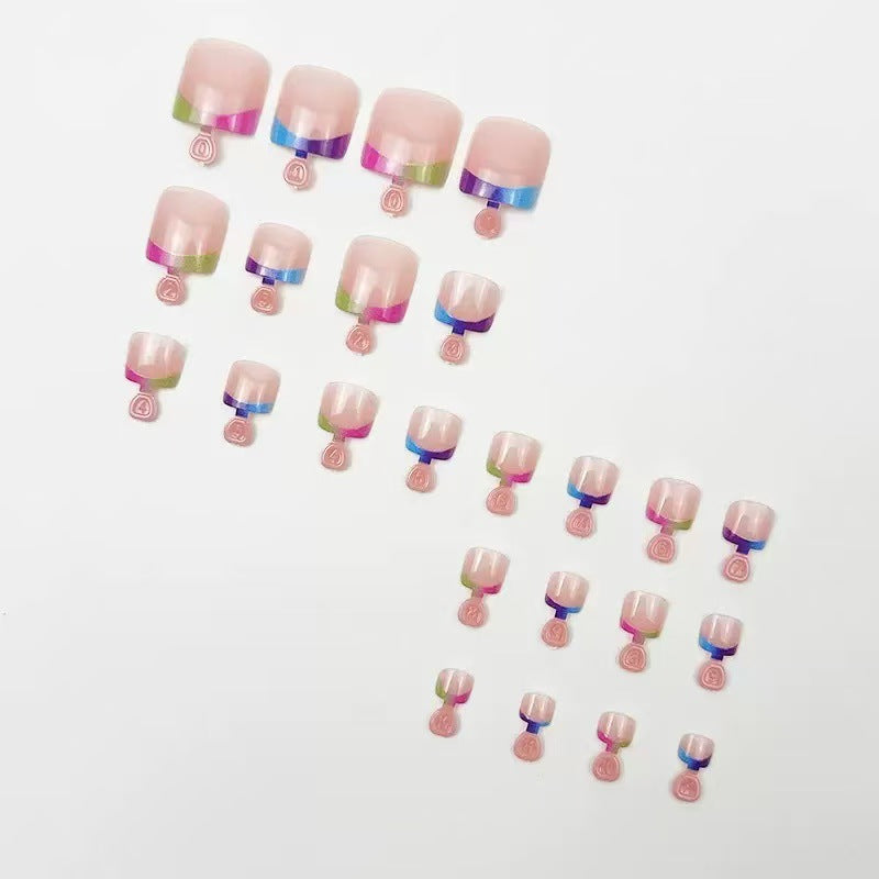 Artificial nail set with colorful gradient and trendy accents Stornfield