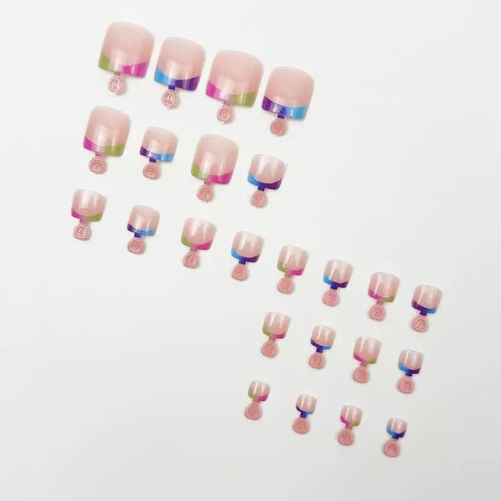 Artificial nail set with colorful gradient and trendy accents Stornfield