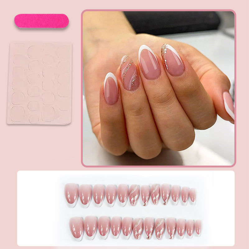 Artificial nails with elegant French tips and glittering accents Stornfield