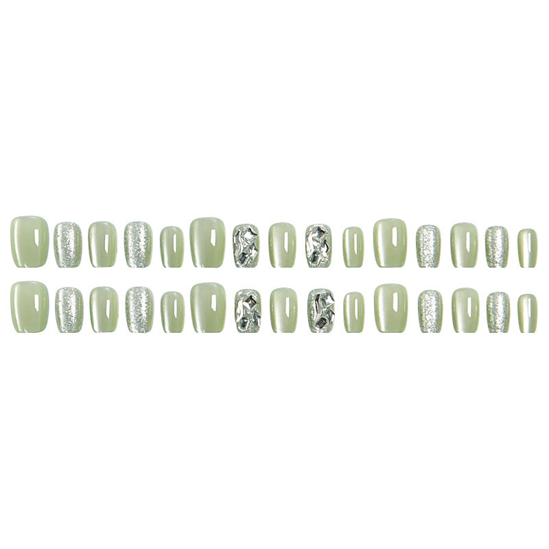 Acrylic nail set with elegant glitter design and creative effects Stornfield