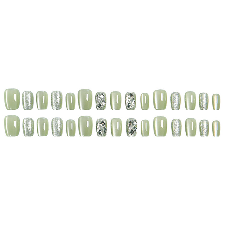 Acrylic nail set with elegant glitter design and creative effects Stornfield