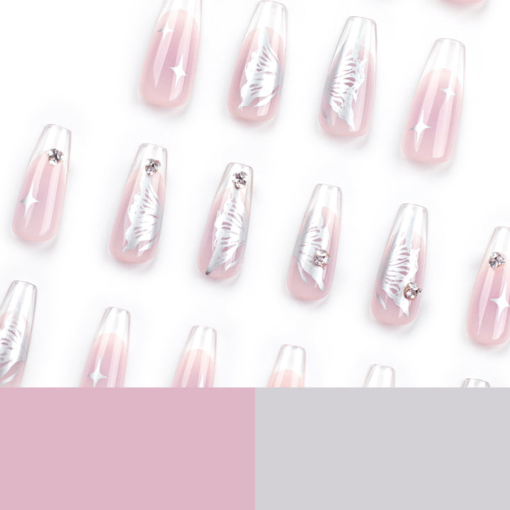 Elegant artificial nails with floral designs and glitter accents Stornfield