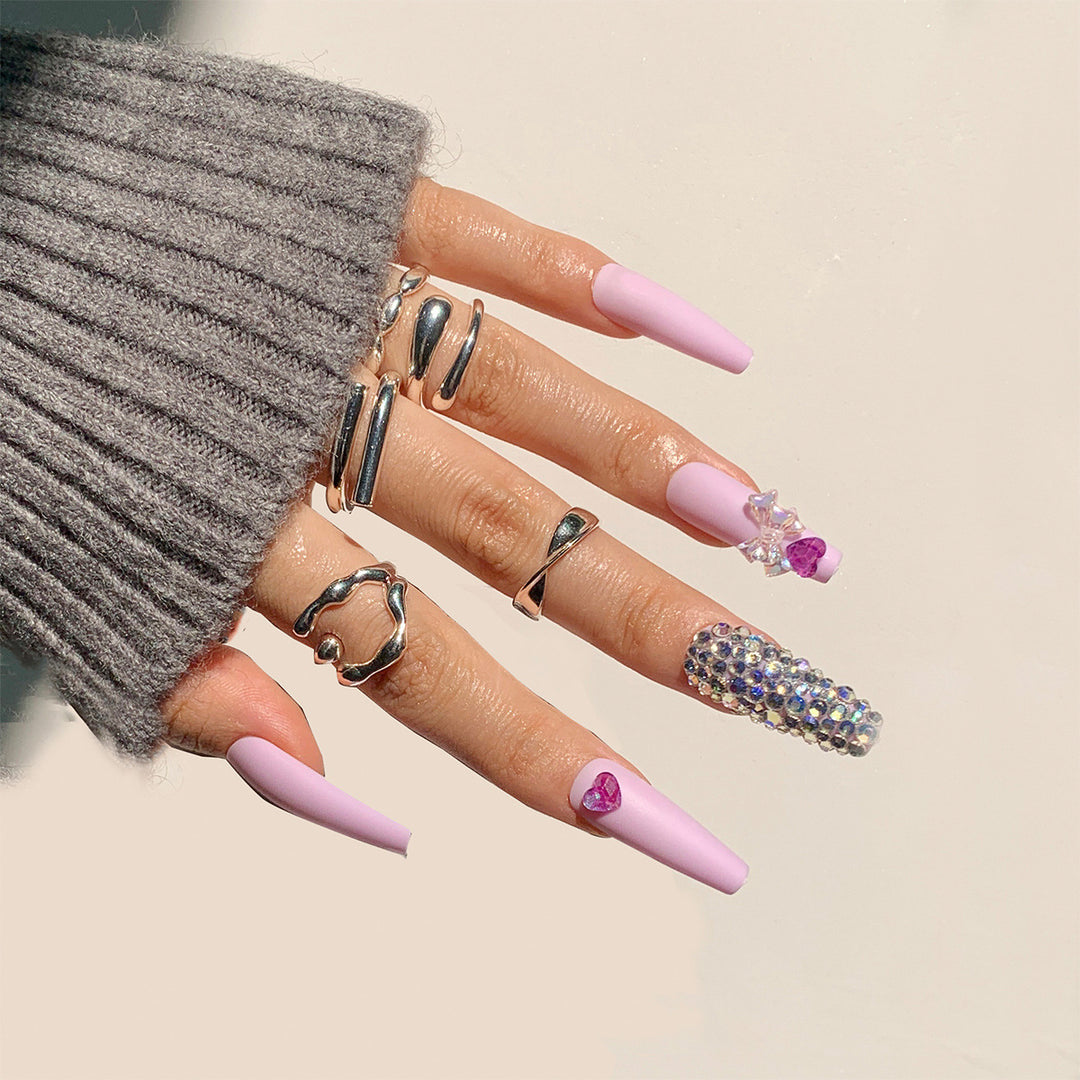 Artistic Stiletto Nails with Glitter and Flower Decorations Stornfield