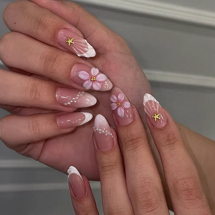 Artifical nail set with delicate flower and decorative elements Stornfield